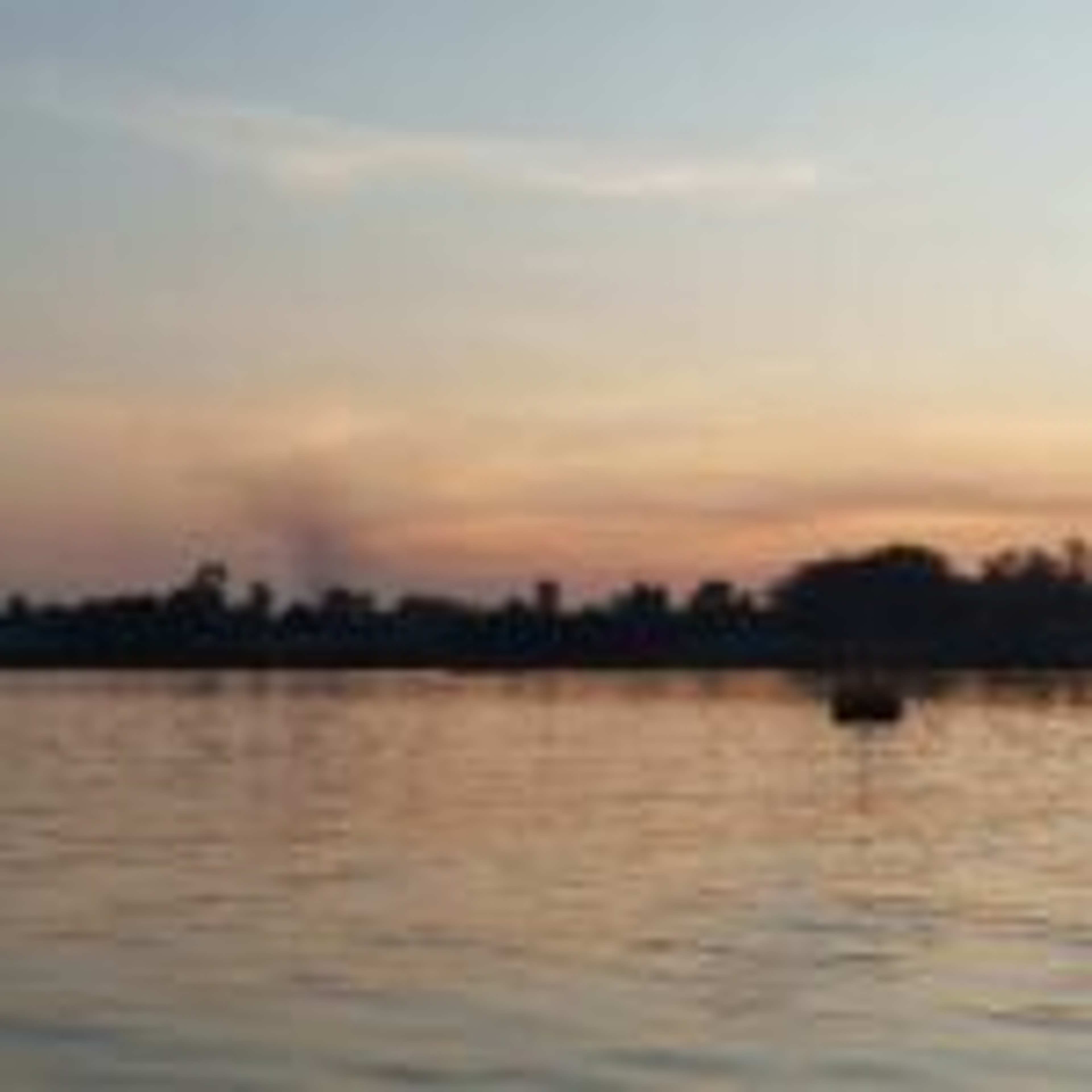Crossing from Cambodia to Vietnam by Boat down the Mekong: a Cinematic Experience