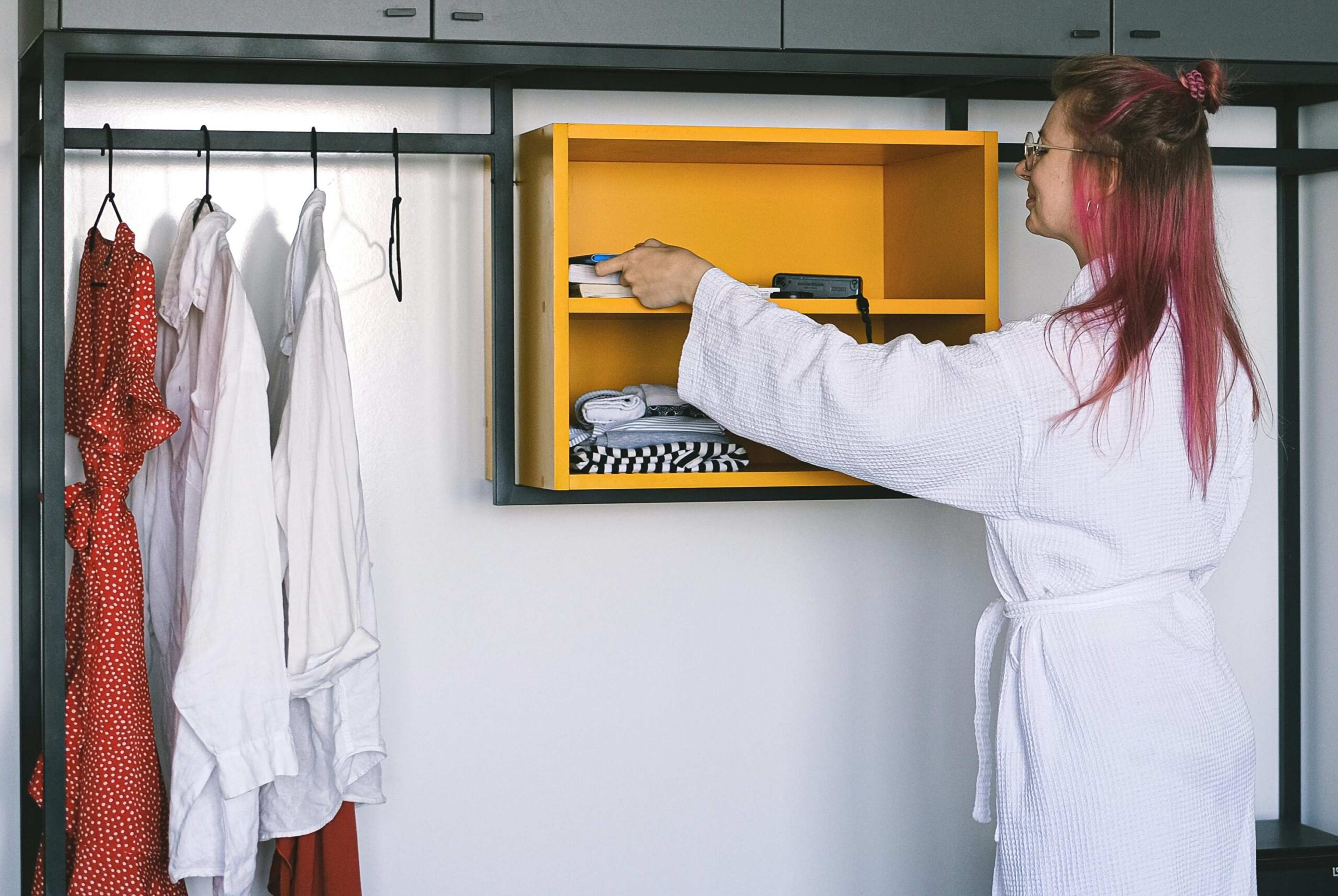 There's a Silent Confession in the Way You Immediately Unpack Your Entire Suitcase Into the Hotel Closet – It's a Desperate Attempt to Claim Territory in a World That Has Always Felt Temporary