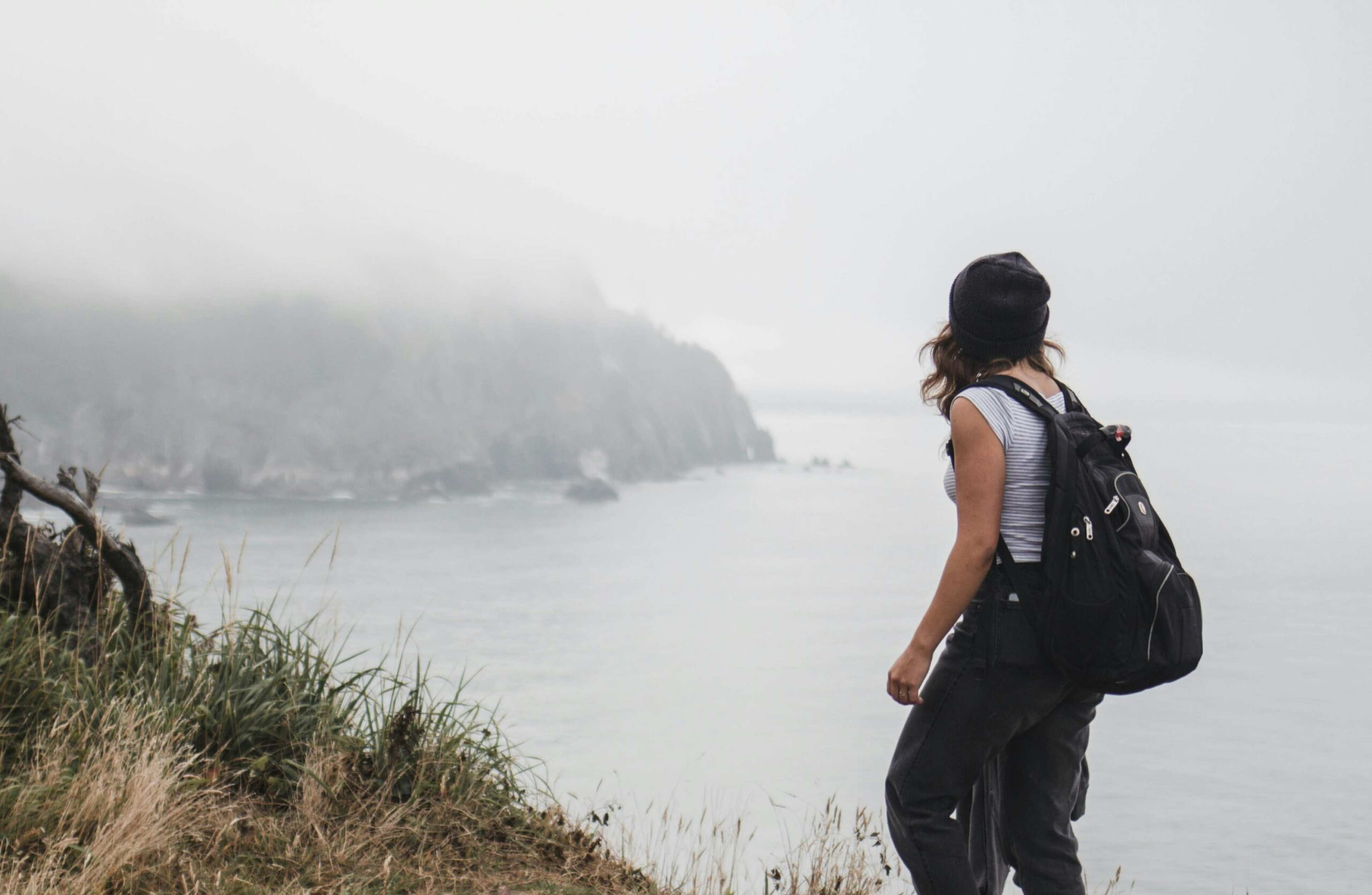 The Reason You'd Rather Walk Through a "Foggy, Overcast" Coastal Town Than a Sunny Resort Is That the Weather Finally Matches the Complexity of Your Internal Landscape