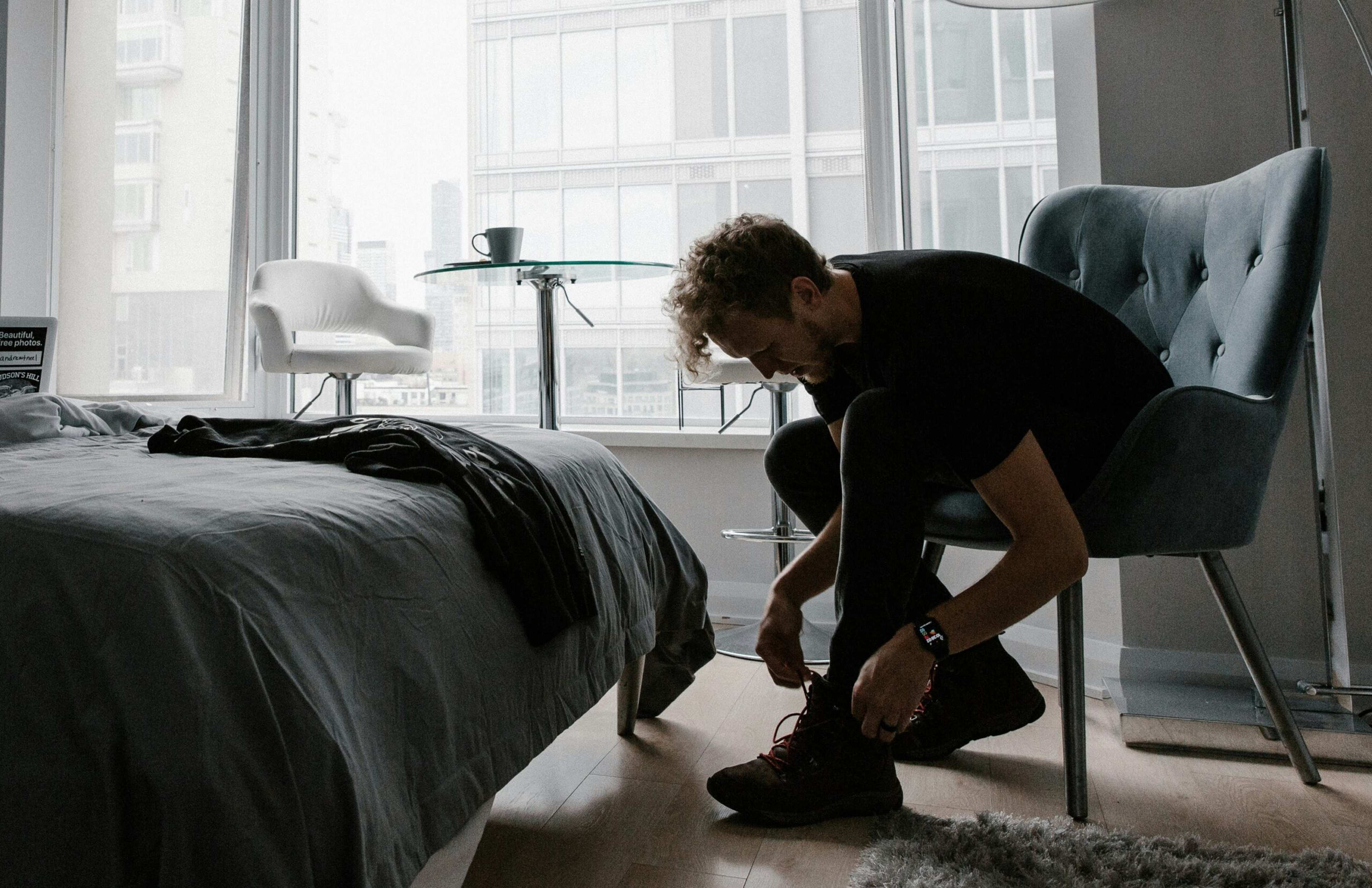The Reason You Always Keep Your Shoes Near the Bed in a Hotel Room Is a Hyper-Vigilant Instinct About Being Ready for a "Midnight Escape" That Your Brain Still Thinks Is Coming