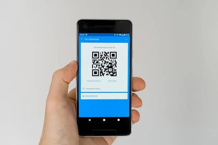 QR Code Scams and Malicious Charging Stations (Image Credits: Unsplash)