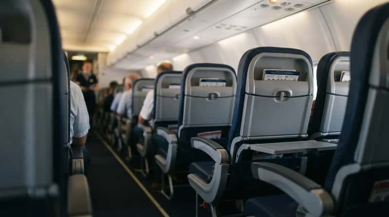 #8 - Whether Tray Tables Are Up and Seat Backs Are Forward (Image Credits: Gemini)
