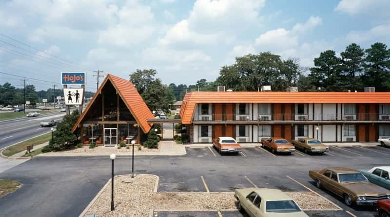5. Howard Johnson's Motor Lodges: The Orange Roof Empire (Image Credits: Gemini)