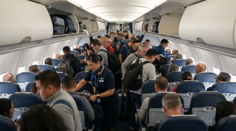 #12 - Use the Lavatory During Boarding (Image Credits: Gemini)