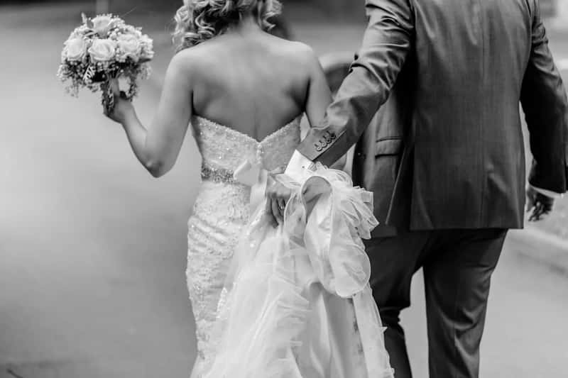 Carrying the bride over the threshold (Image Credits: Unsplash)