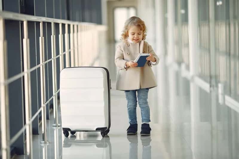 Myth 7: Kids are automatically covered under a parent's passport (Image Credits: Pexels)