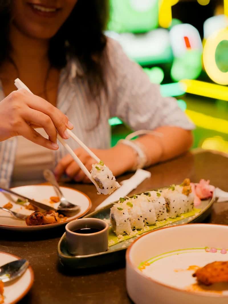 Use Serving Utensils and Respect the Turntable (Image Credits: Unsplash)