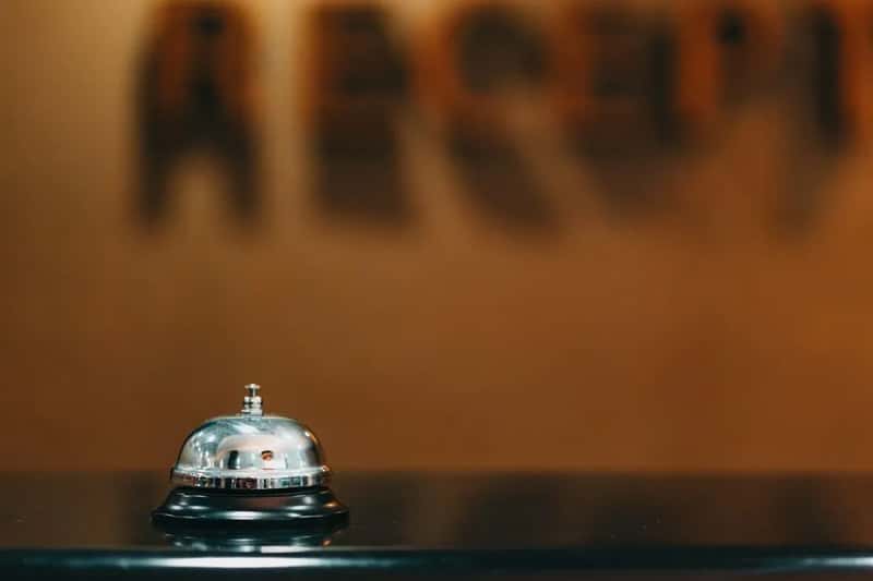 7. The Questions a Guest Asks at Check-In (Image Credits: Pexels)