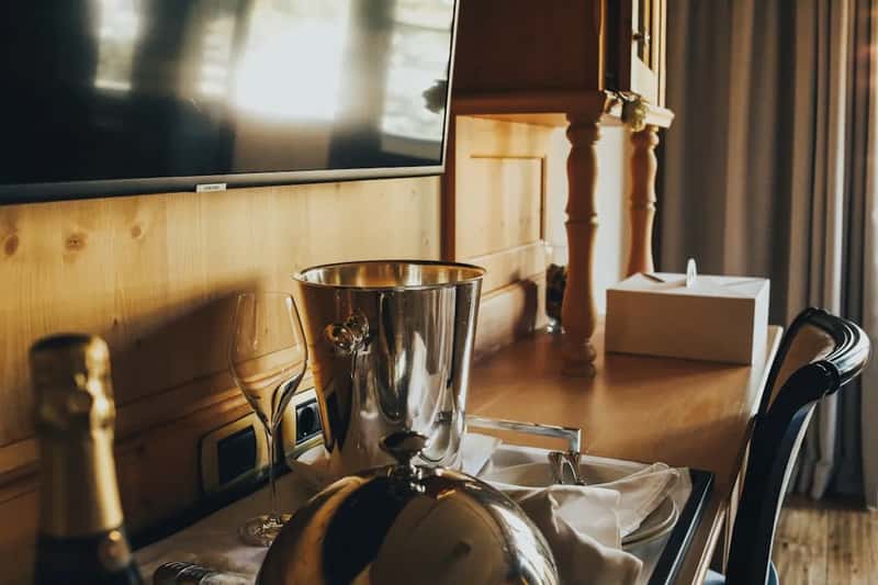 5. The ice bucket and sofa cushions are the room's real trouble spots (Image Credits: Unsplash)