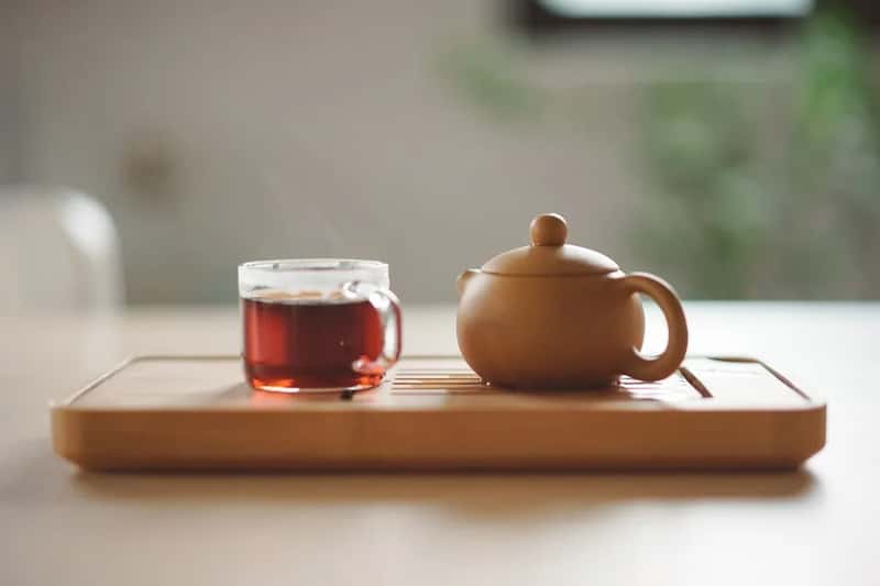 China: water and tea still rule the table (Image Credits: Unsplash)