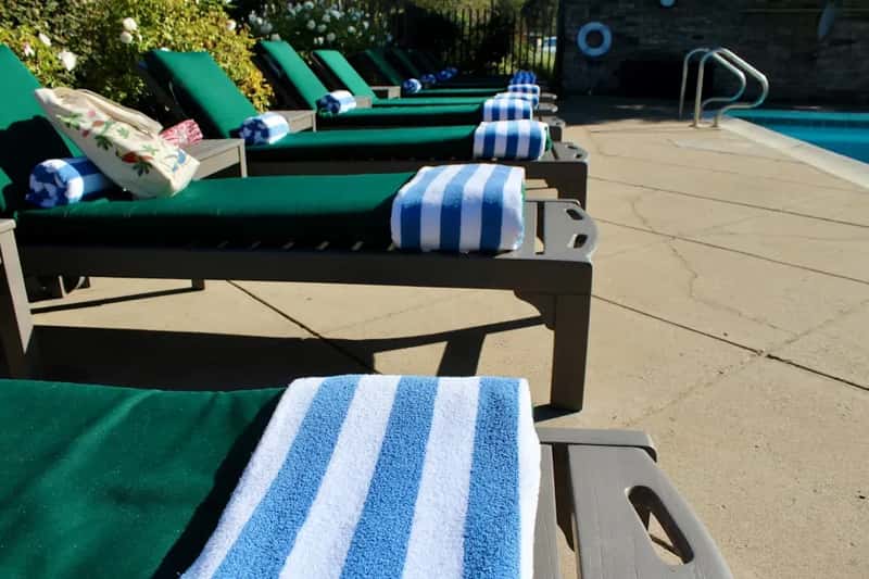 6. Chair-Hogging at the Pool Without Actually Being There (Image Credits: Unsplash)