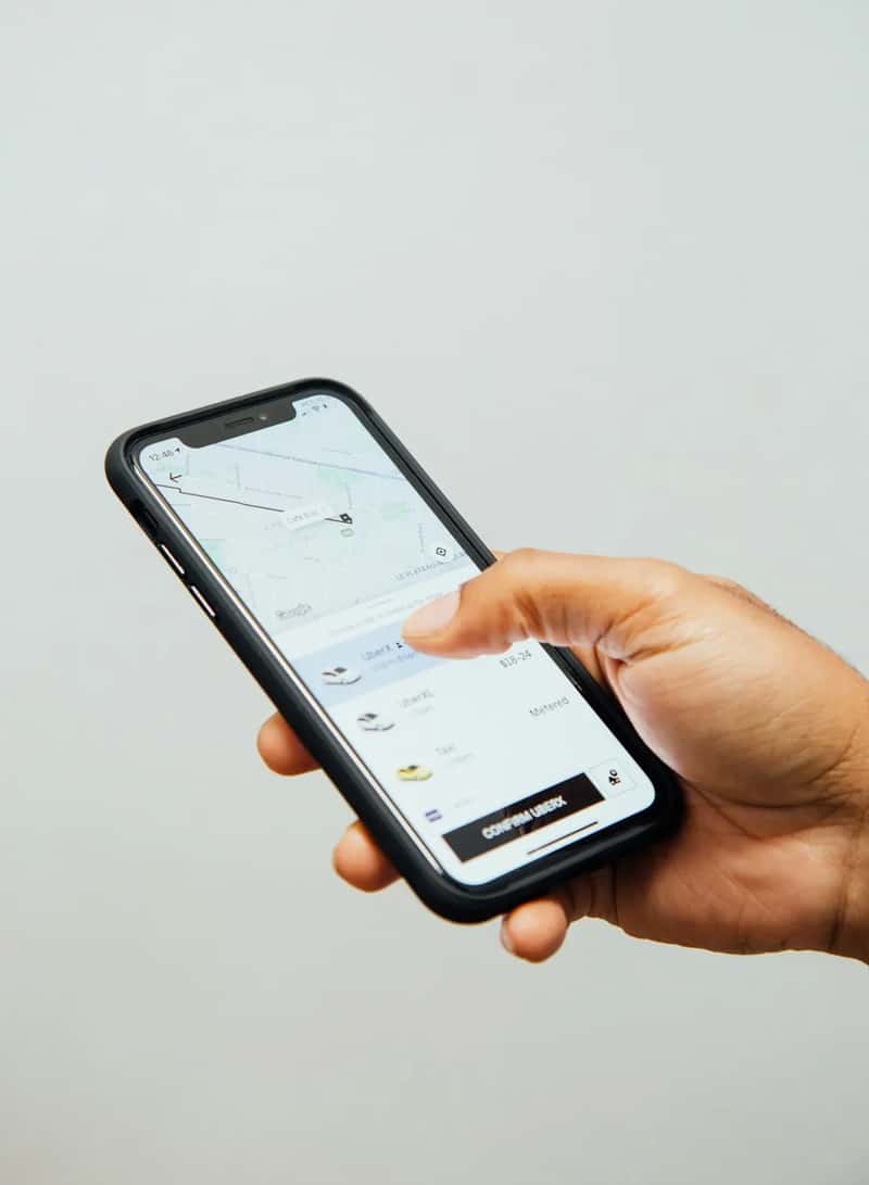 8. Relying on ride hailing apps instead of renting a car or hailing a taxi (Image Credits: Unsplash)