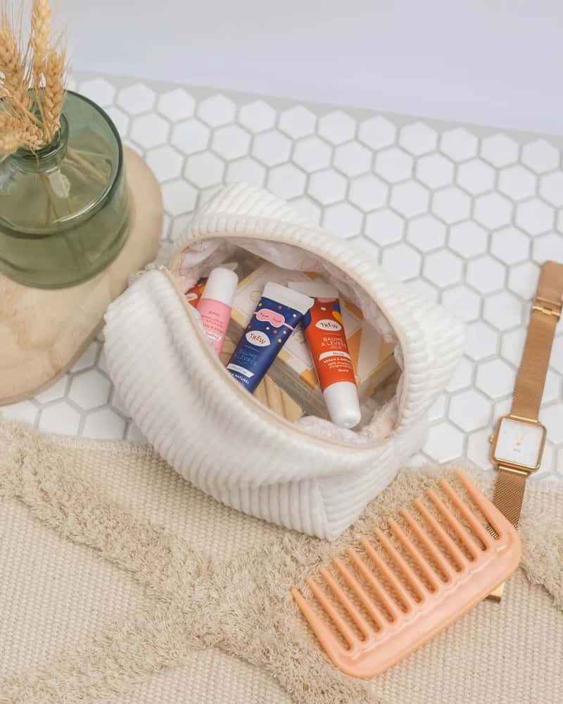 5. A slim toiletry bag stocked entirely in miniatures (Image Credits: Unsplash)