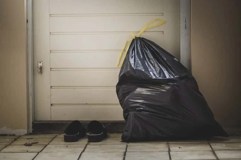 5. Letting trash pile up everywhere except the actual trash can (Image Credits: Unsplash)