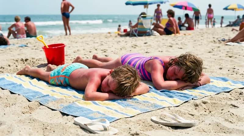 #10 - Sunburned Kids on a Beach Towel (Image Credits: Gemini)