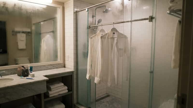 #2 - Shirts Hanging in a Steamy Bathroom (Image Credits: Gemini)