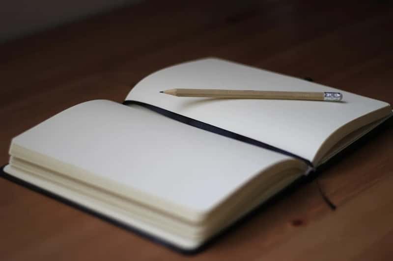 4. Keeping a handwritten travel journal (Image Credits: Unsplash)