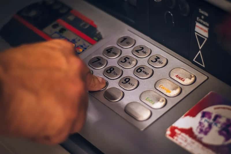 4. Making too many small ATM withdrawals (Image Credits: Unsplash)
