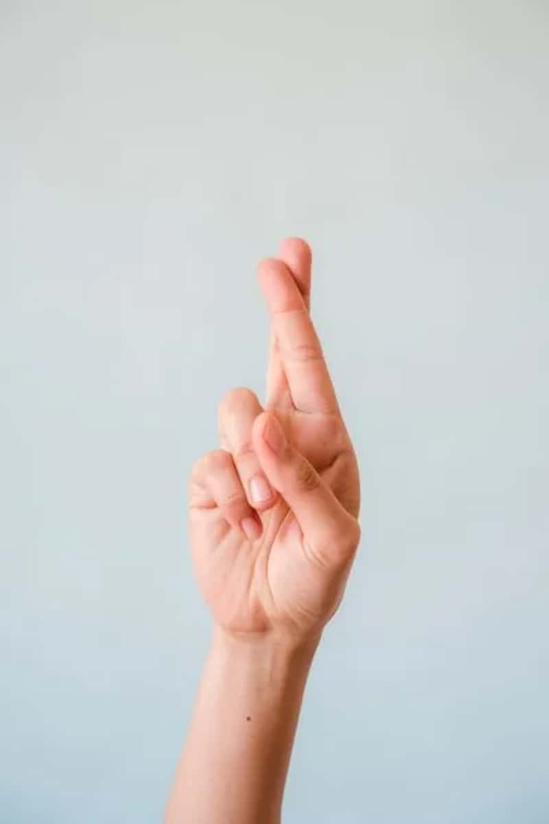 Crossed Fingers (Image Credits: Pexels)