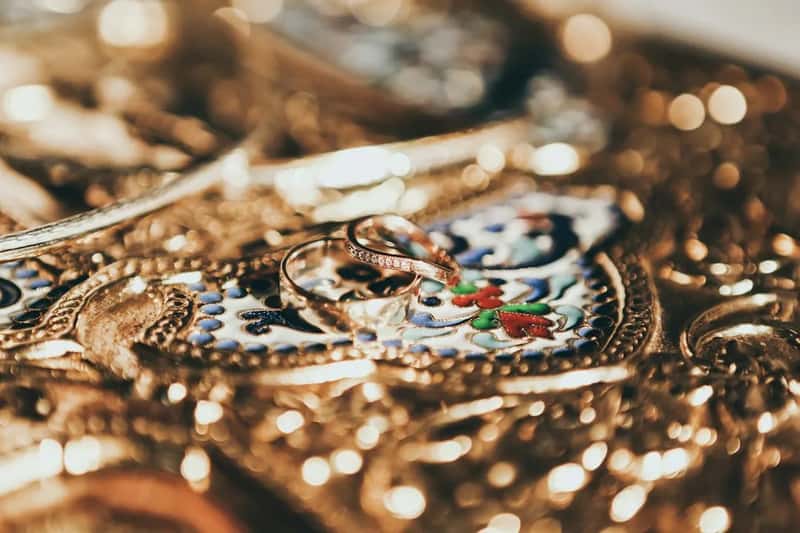 6. Head-to-toe metal and statement jewelry (Image Credits: Unsplash)