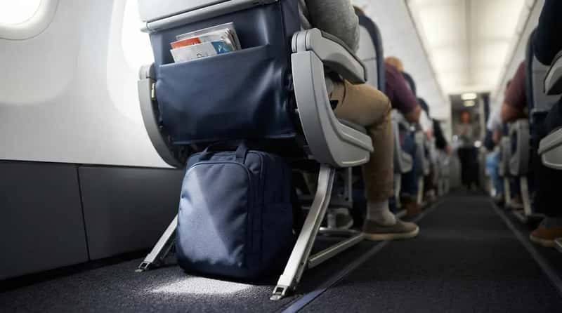 #10 - They Pack an Under-Seat Kit, Because the Overhead Bin Is a Lottery (Image Credits: Gemini)