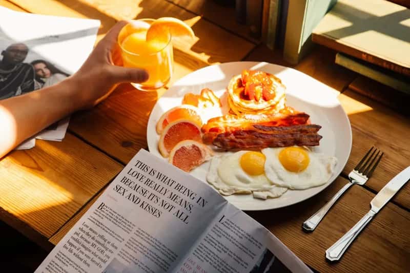 #17 - Reading the Newspaper Together at Breakfast (Image Credits: Unsplash)