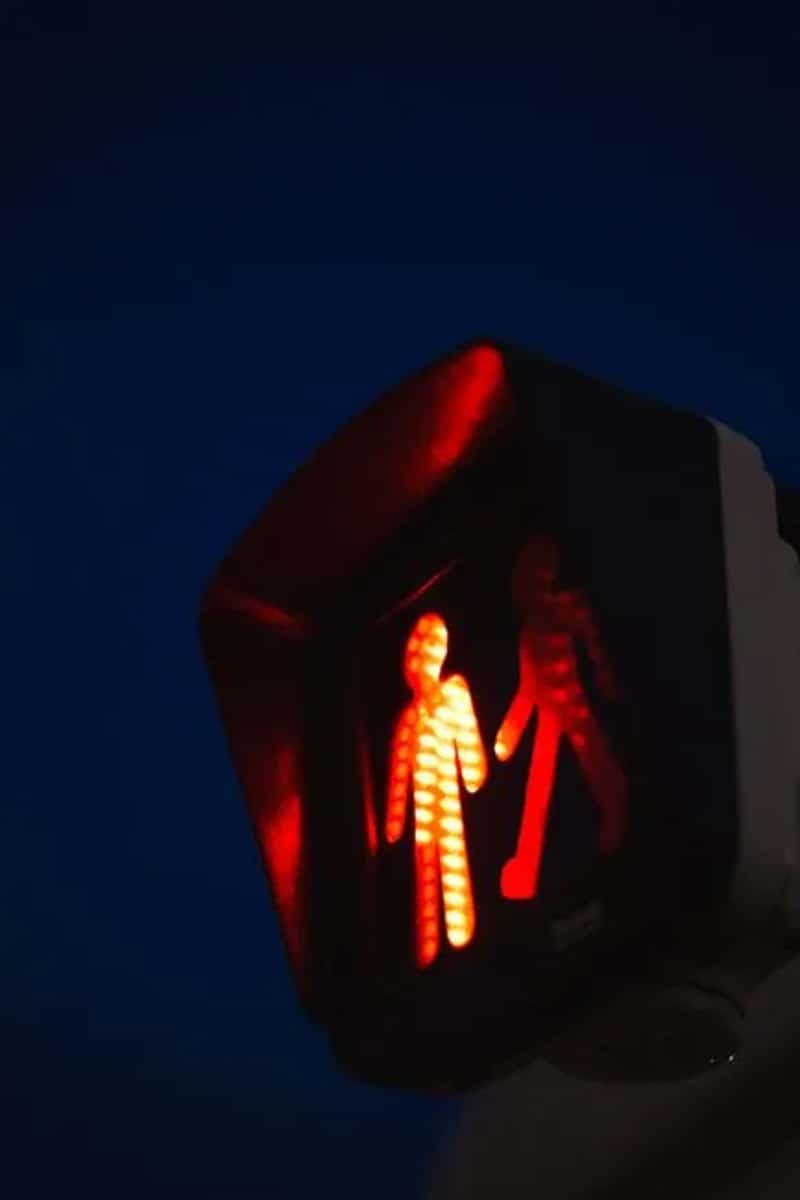 Crossing Against the Red Light (Image Credits: Pexels)