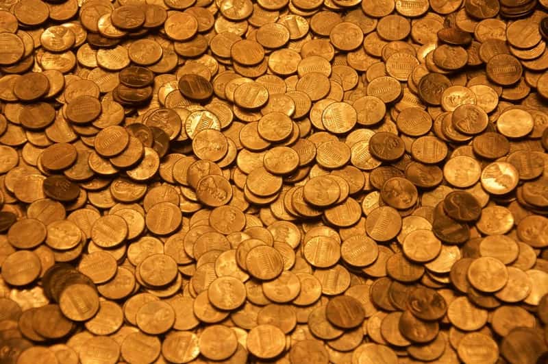 2. Carrying small bills and coins instead of always tapping a card (Image Credits: Unsplash)