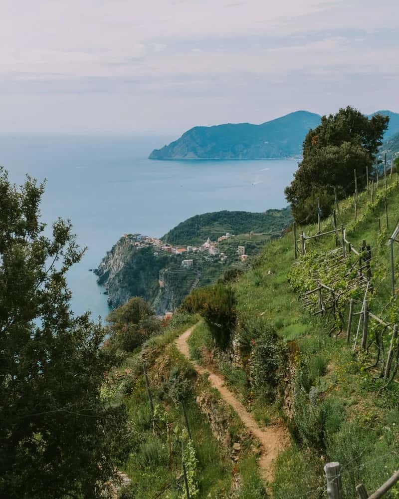 Wearing flip flops on Italy's Cinque Terre trails (Image Credits: Unsplash)