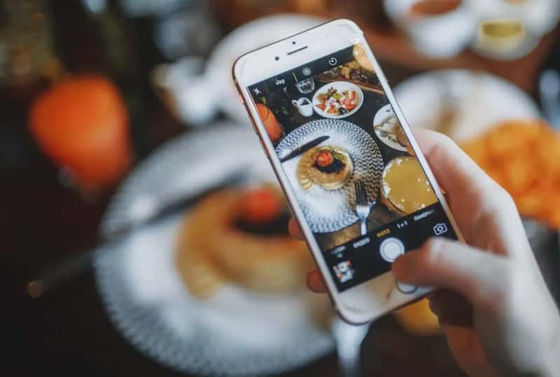6. Photographing every dish in fine dining settings (Image Credits: Pexels)