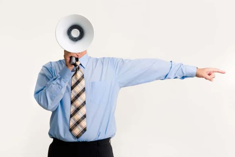 1. Speaking loudly in quiet public spaces (Image Credits: Pexels)