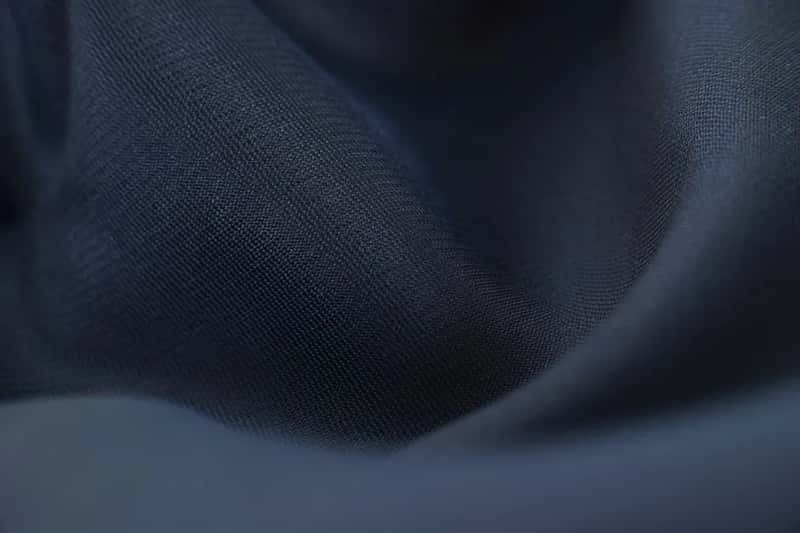 5. Synthetic fabrics like polyester, nylon, and acrylic (Image Credits: Pexels)