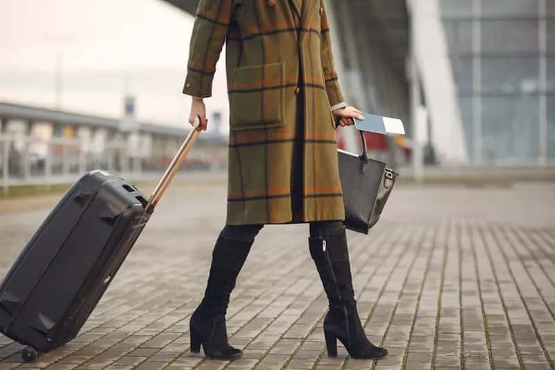 #10 - Wear Your Bulkiest Items Onto the Plane, Not in the Bag (Image Credits: Pexels)