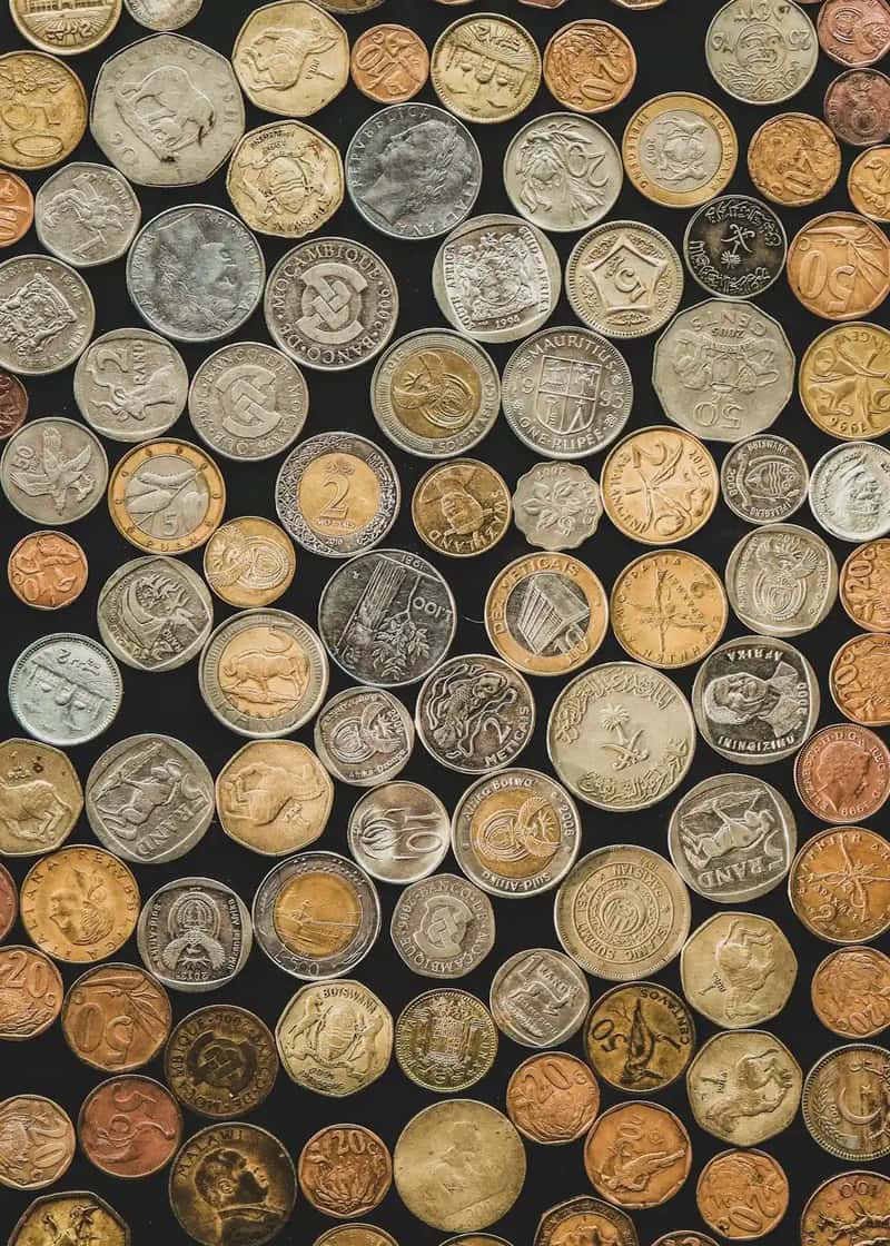 Pottery shards, ancient coins, and small artifacts from historic sites (Image Credits: Unsplash)