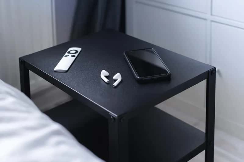 #9 - They Put a Charged Phone and Flashlight Within Arm's Reach of the Bed (Image Credits: Unsplash)