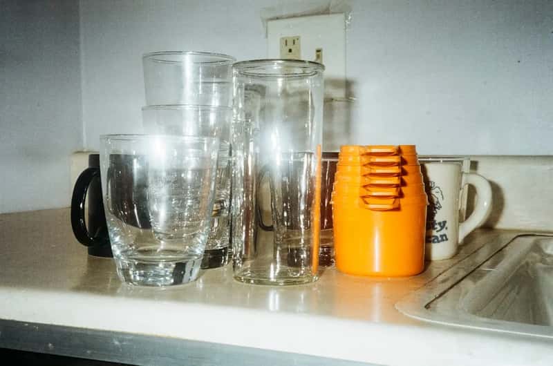 Drinking glasses are sometimes rinsed instead of properly washed (Image Credits: Unsplash)
