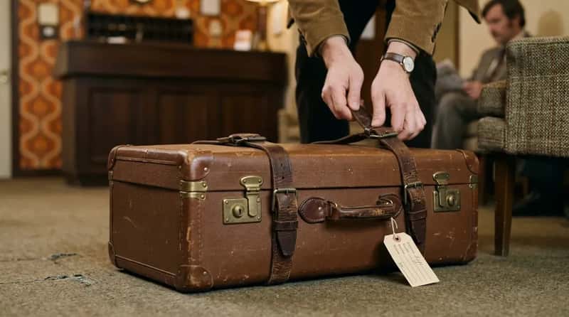 #7 - Securing the Suitcase With External Leather Straps (Image Credits: Gemini)