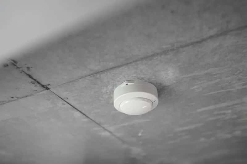 7. They Test the Smoke Detector and Basic Safety Equipment (Image Credits: Unsplash)