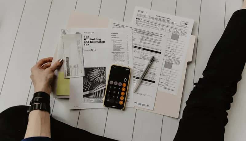 Taxes and Financial Considerations (Image Credits: Unsplash)