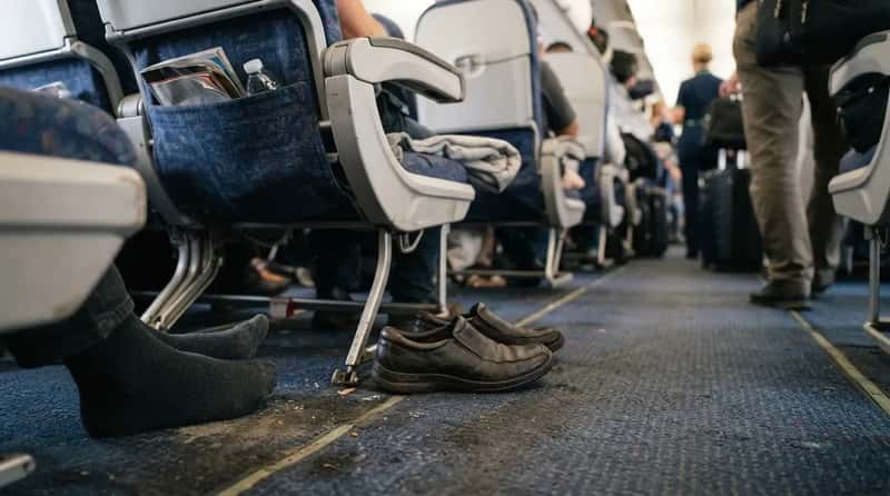 #21 - Kicking Off Your Shoes the Second You Sit Down (Image Credits: Gemini)