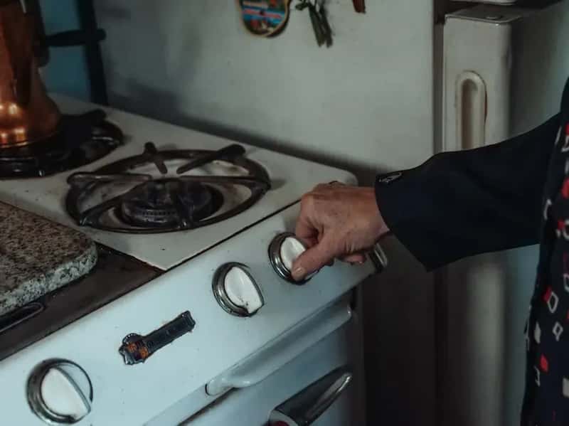 #3 - They Do a Quick Visual Check of the Stove and Appliances Before Bed (Image Credits: Pexels)