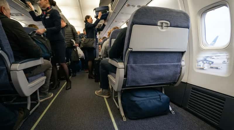 #9 - Racing to the Gate to Protect a Bag That Fits Under the Seat (Image Credits: Gemini)