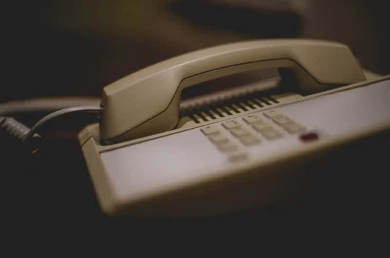 9. In-Room Phone Calls: An Old Fee That Never Left (Image Credits: Unsplash)