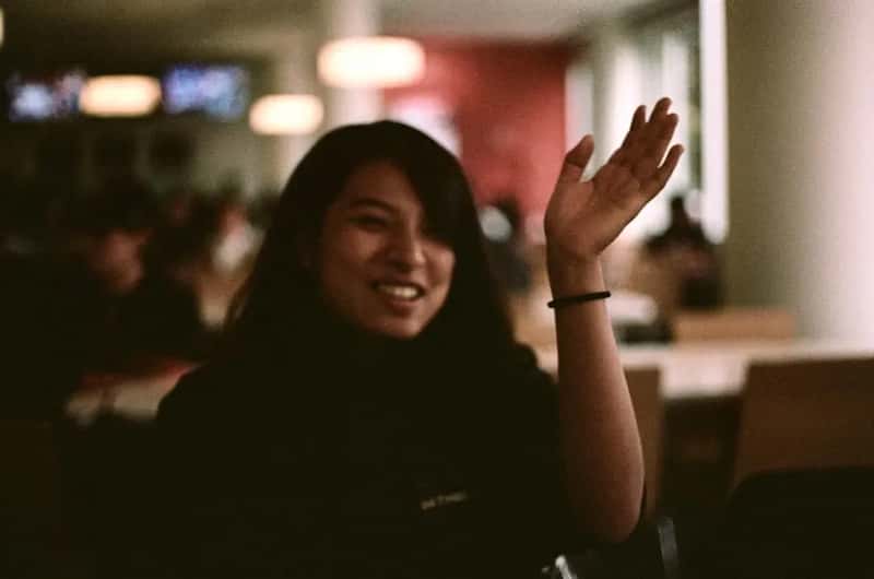 3. Snapping, Whistling, or Waving Your Arms at the Server (Image Credits: Unsplash)