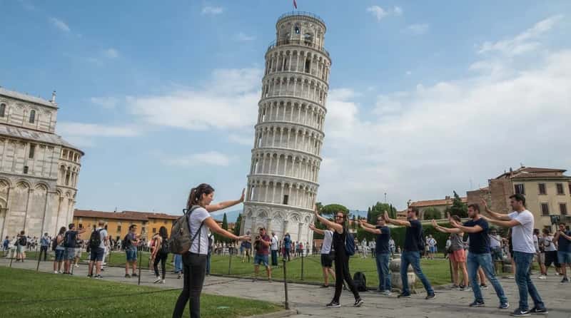 #15 - "Can You Take My Photo Holding Up the Tower?" The Pisa Pose (Image Credits: Gemini)