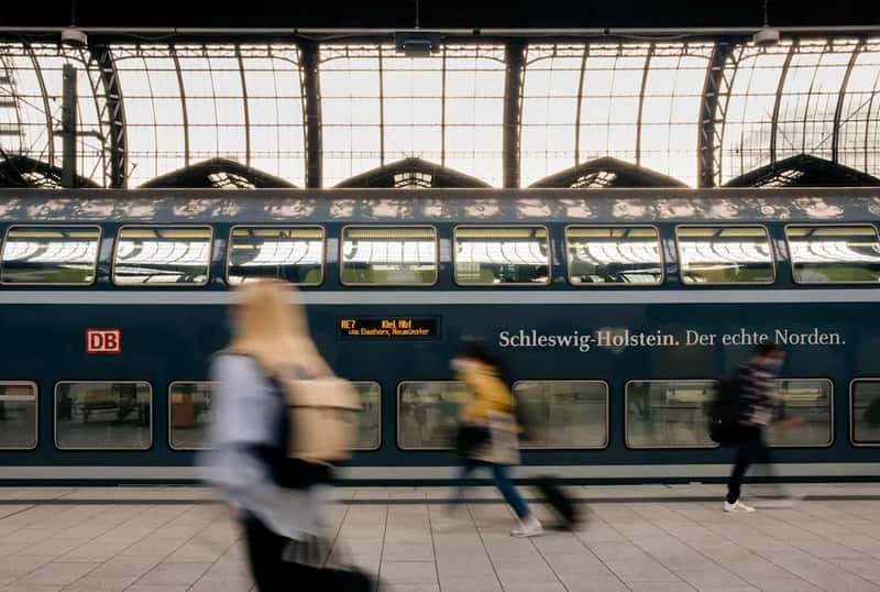 3. Trains are quiet spaces, not phone booths (Image Credits: Unsplash)