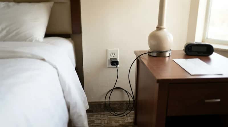 #13 - The Phone Charger Still Plugged In Beside Your Bed (Image Credits: Gemini)