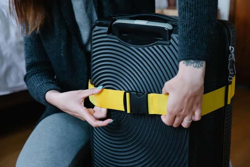 4. Letting Straps, Pockets, and Compression Buckles Dangle Loose (Image Credits: Pexels)