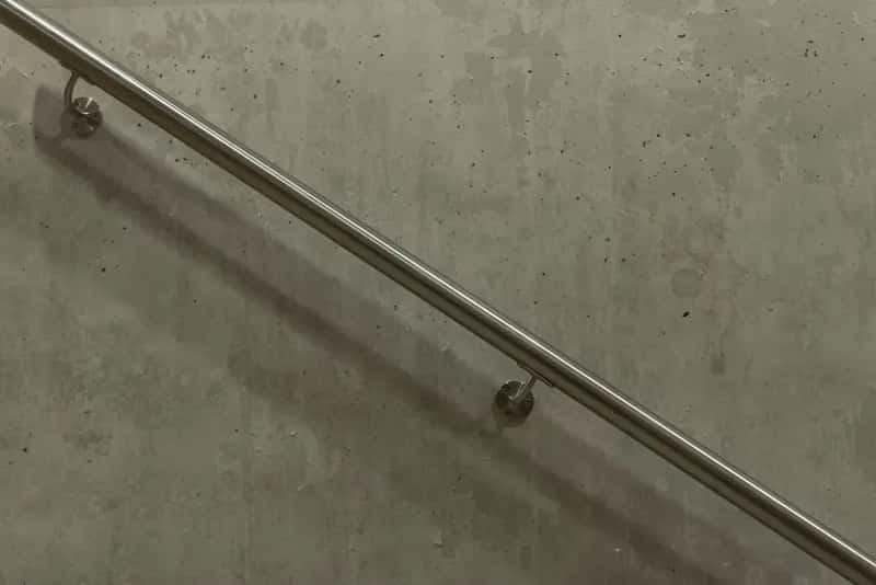 #3 - Checking Handrail Anchoring Into Wall Studs (Not Just Drywall) (Image Credits: Pexels)