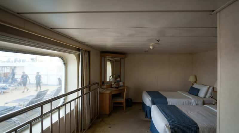 #1 - The Cabin Right Under the Pool Deck (Image Credits: Gemini)